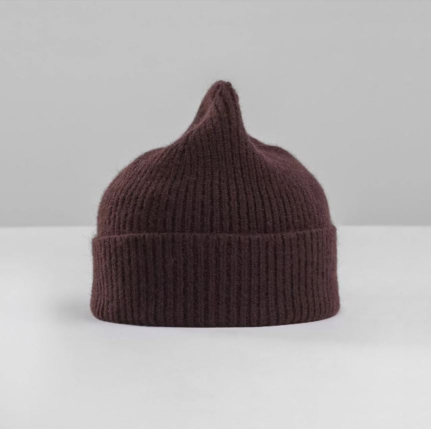 Flat lay of ribbed espresso beanie in soft lambswool and Caregora blend, classic silhouette in wool knit, made in Scotland