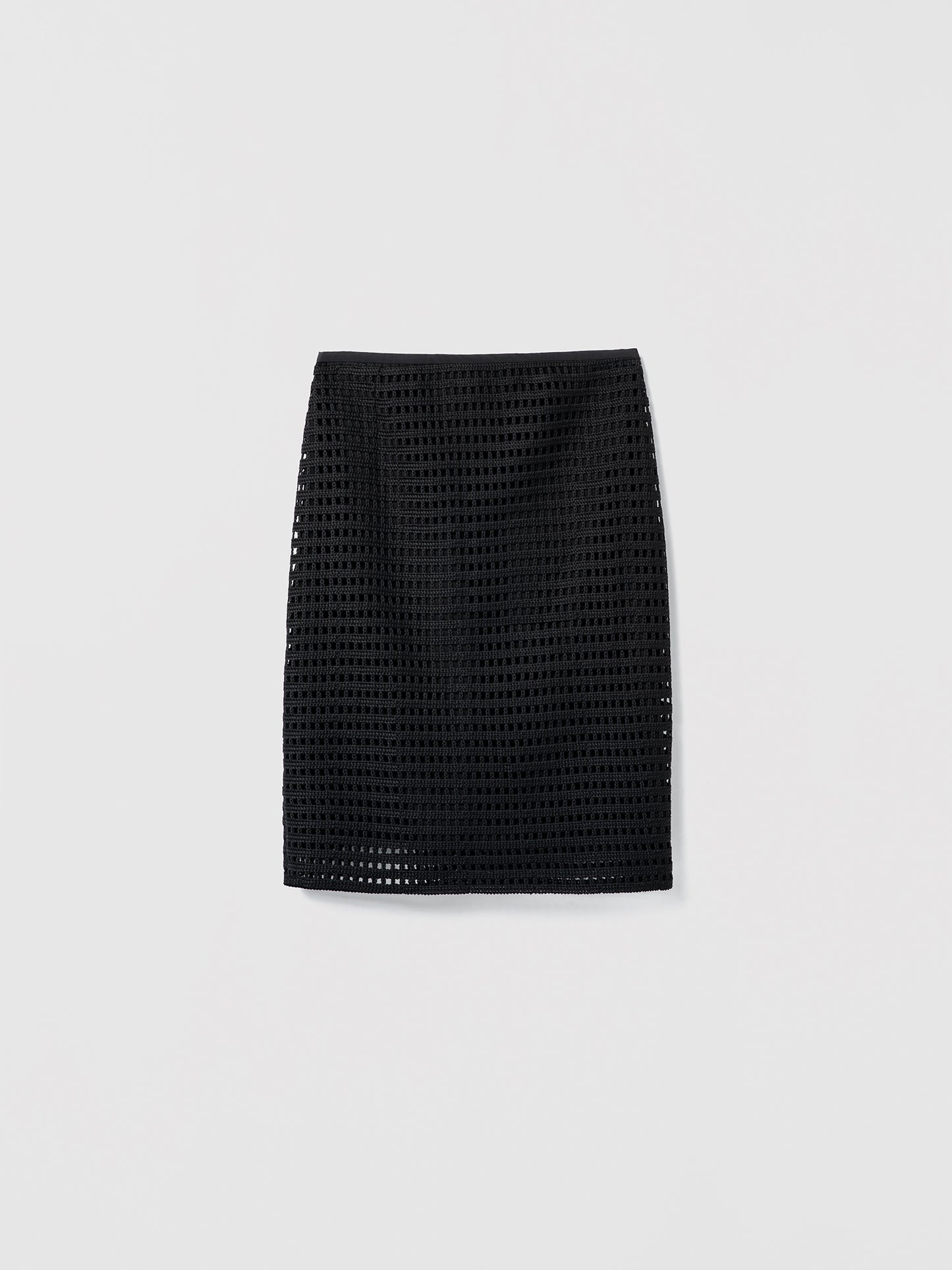 Black textured pencil skirt on a light gray background