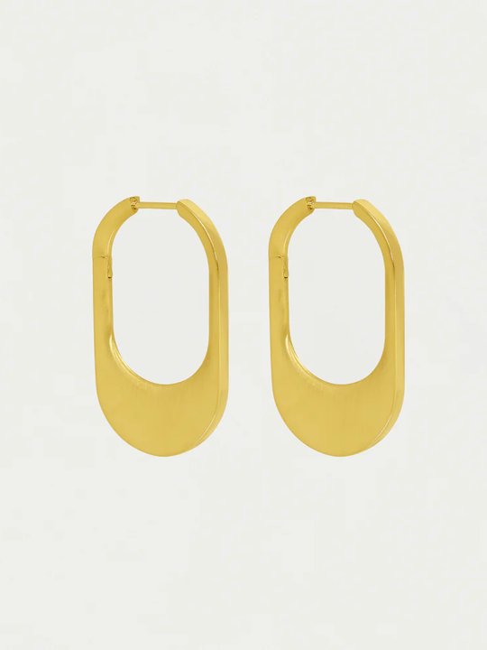 Gold U-form hoop earrings on a light gray background