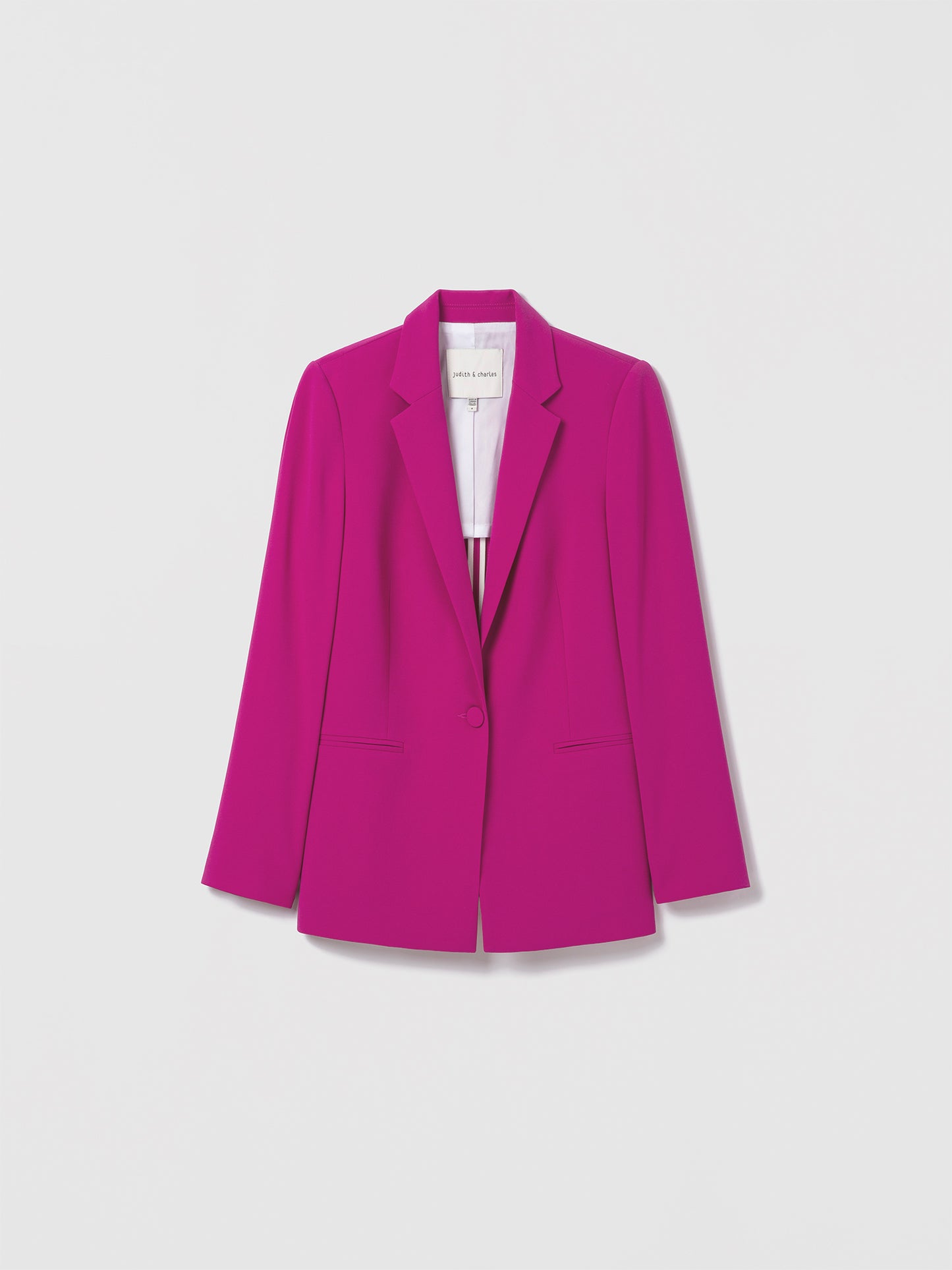 Judith & Charles women's single-breasted orchid pink jacket in satin back crepe with notch lapel and flap pockets. Easy fit, partially lined, made in Canada with premium Japanese fabric. Elegant lightweight blazer, 27.5-inch back length.