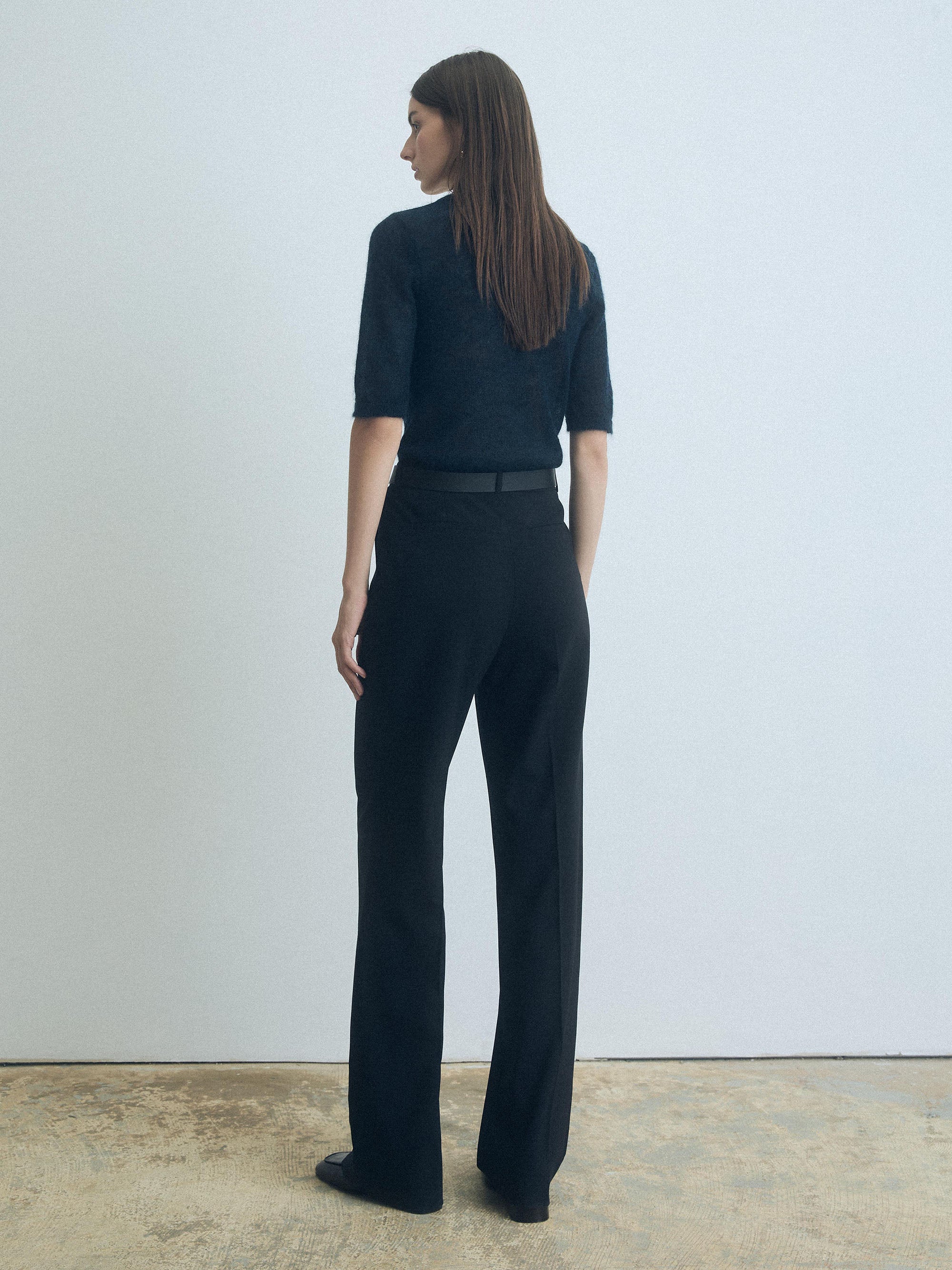 Woman wearing a Deep Ocean cropped mohair pullover with crew neck by Judith & Charles.