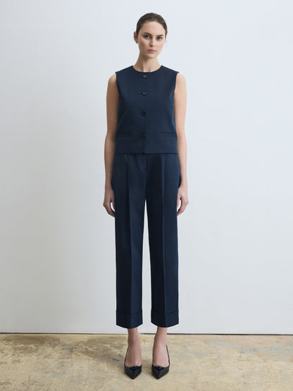 Model wearing navy pants