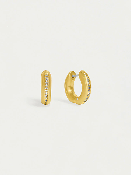 Gold hoop earrings with embedded stones on a light gray background