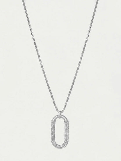 Silver necklace with an oval pendant on a light gray background