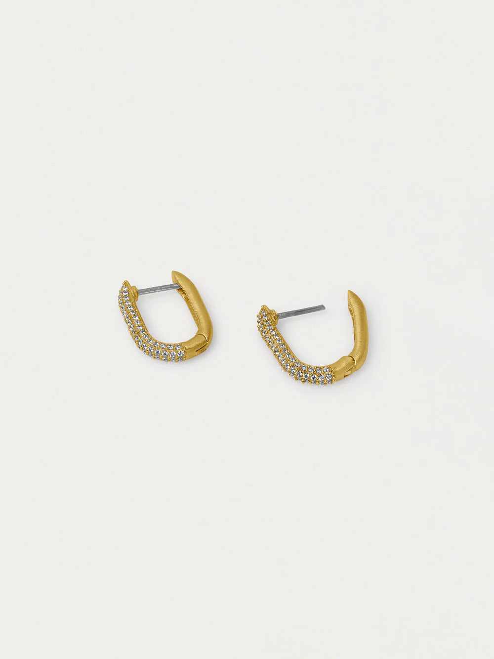 Gold hoop earrings with small stones on a light gray background