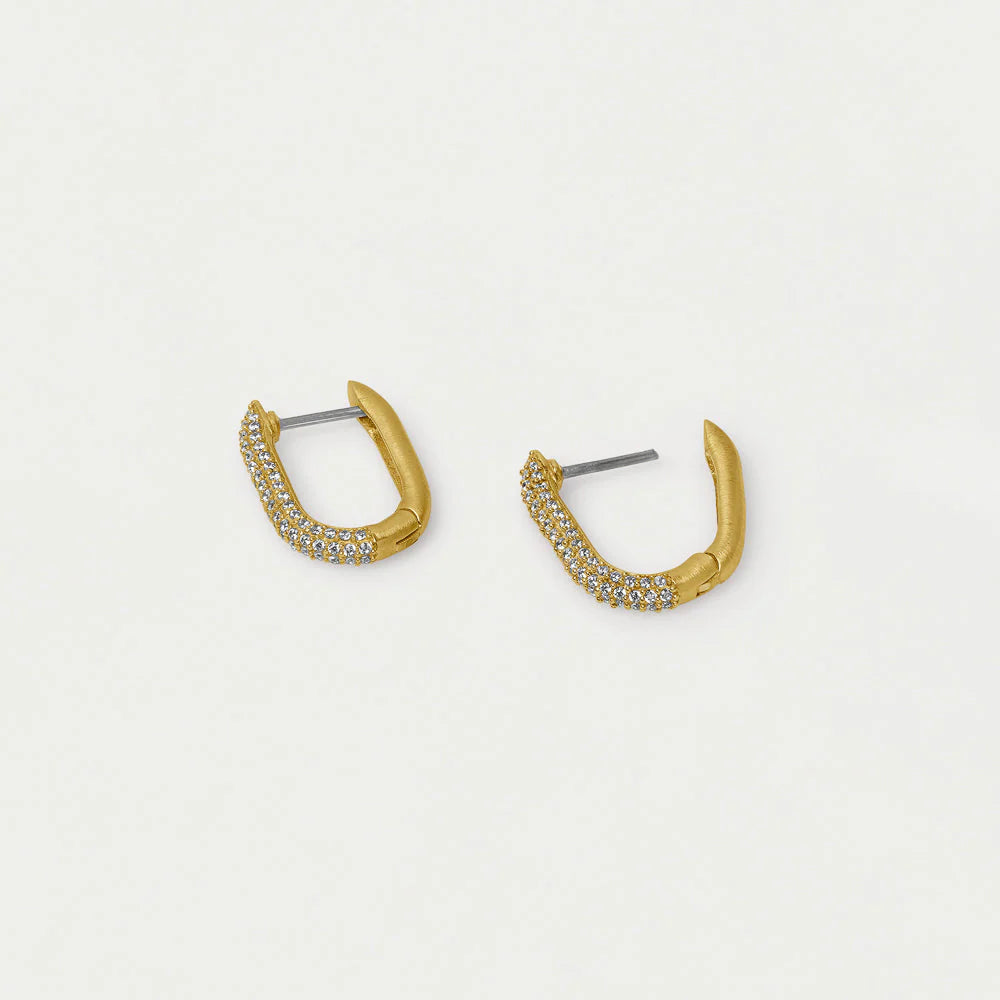 Gold hoop earrings with embedded stones on a light gray background