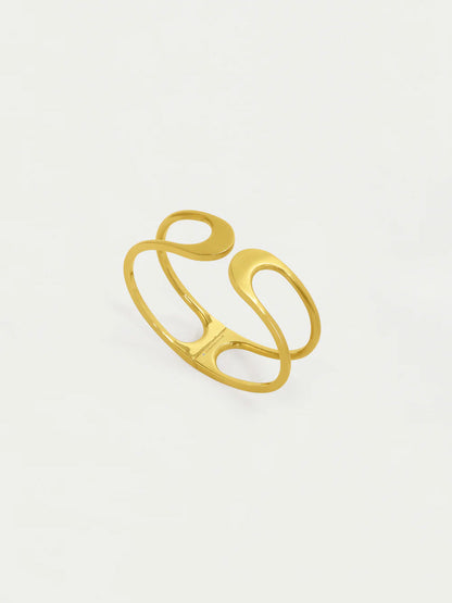 Gold open ring on a light gray background