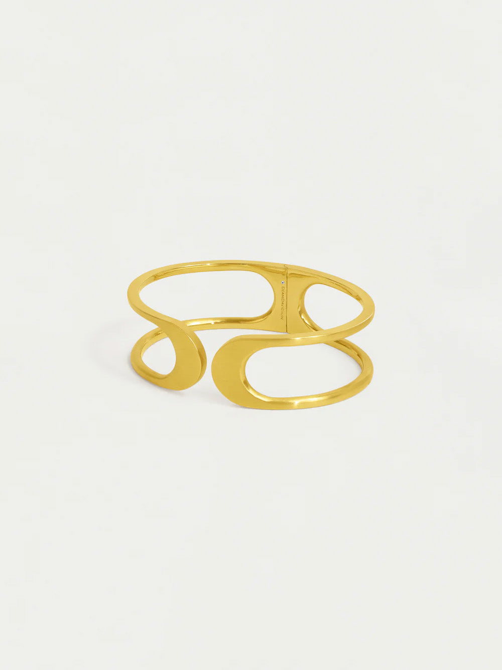 Gold ring with a unique design on a white background
