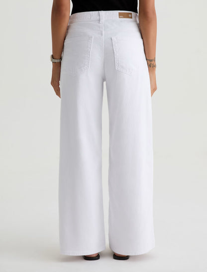 White wide-leg pants worn by a person on a white background