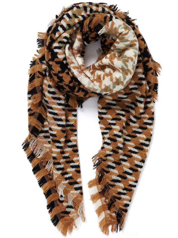 Plaid patterned scarf with fringes on a white background