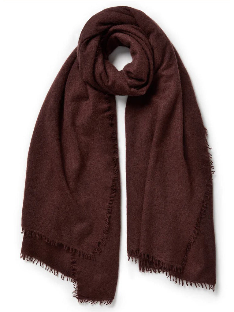 Rosewood scarf with frayed edges on a white background