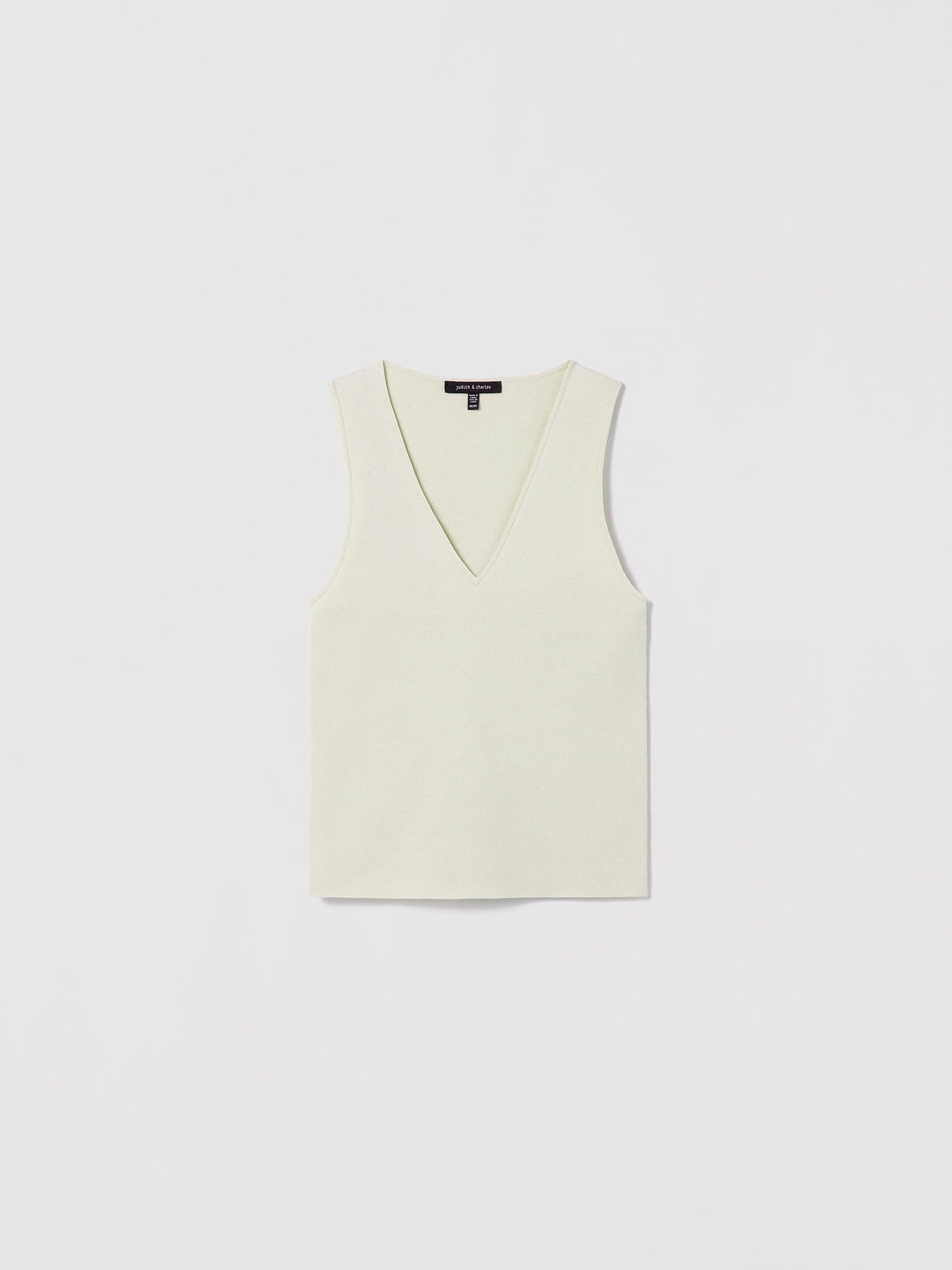 Crema sleeveless V-neck shell top by Judith and Charles, made from a fine Italian silk-cotton blend. Features a fitted silhouette and a 21.5" back length. Style code: 266-4133.