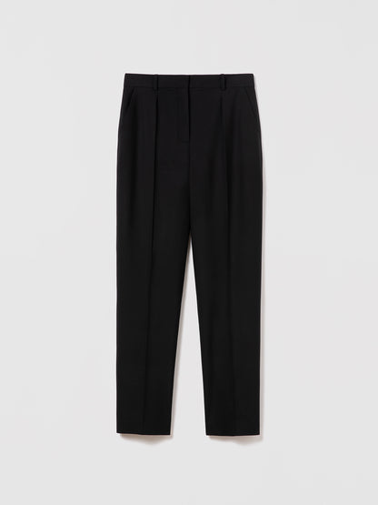 Judith and Charles straight-leg pleated wool pants in black with slash and back welt pockets, hook-and-eye closure, and belt loops
