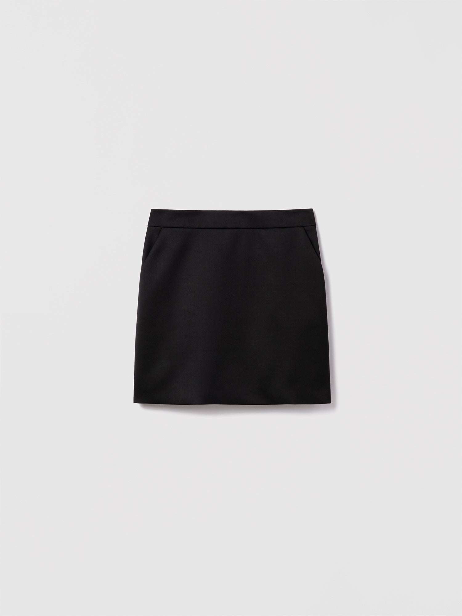 Black Diara skirt by Judith and Charles, short straight style in textured stretch linen with slash pockets. Made in Canada with Italian fabric