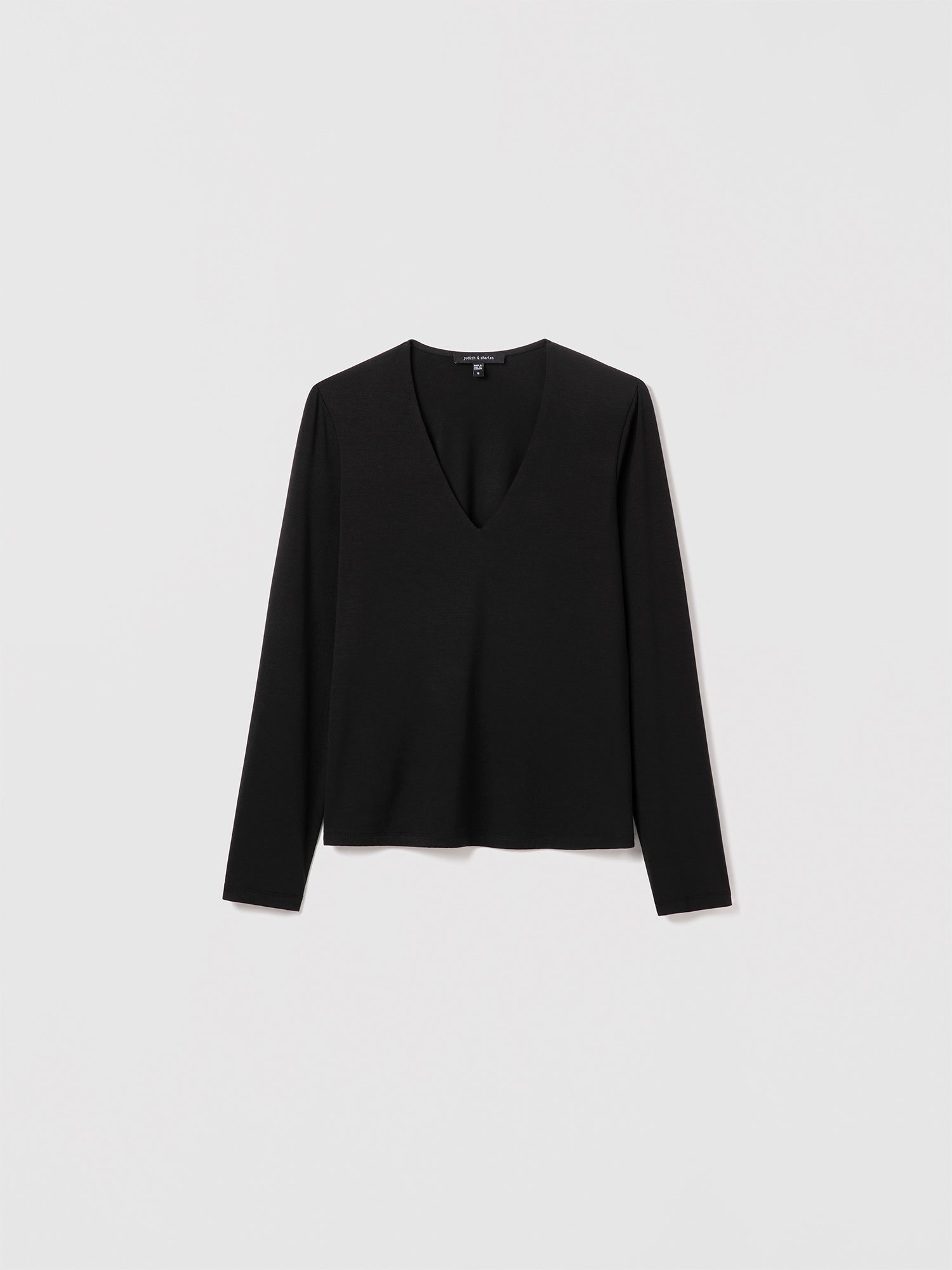 Judith & Charles black V-neck long-sleeve T-shirt in fluid viscose jersey, fitted silhouette.