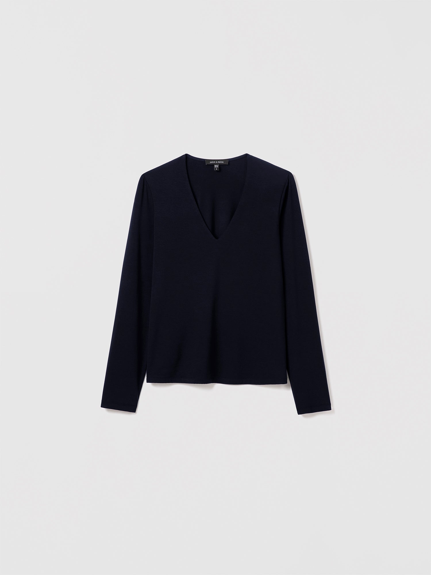 Judith & Charles navy V-neck long-sleeve T-shirt in fluid viscose jersey, fitted silhouette.