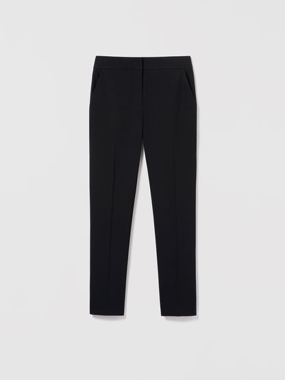 Black pants on a light gray background
