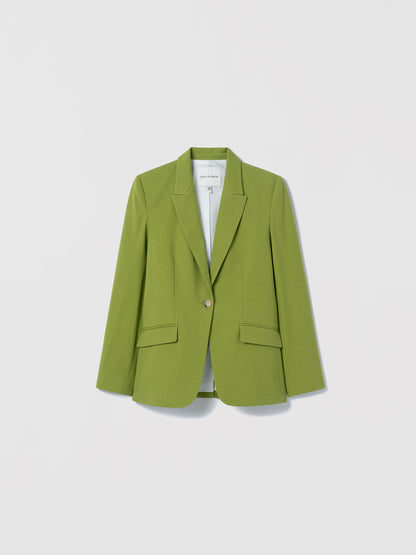 Green blazer on a light gray background