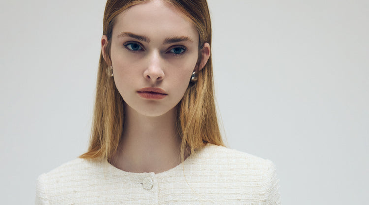 Judith & Charles Spring 2026 “In the Details” banner with light tweed jacket and new arrivals focus.