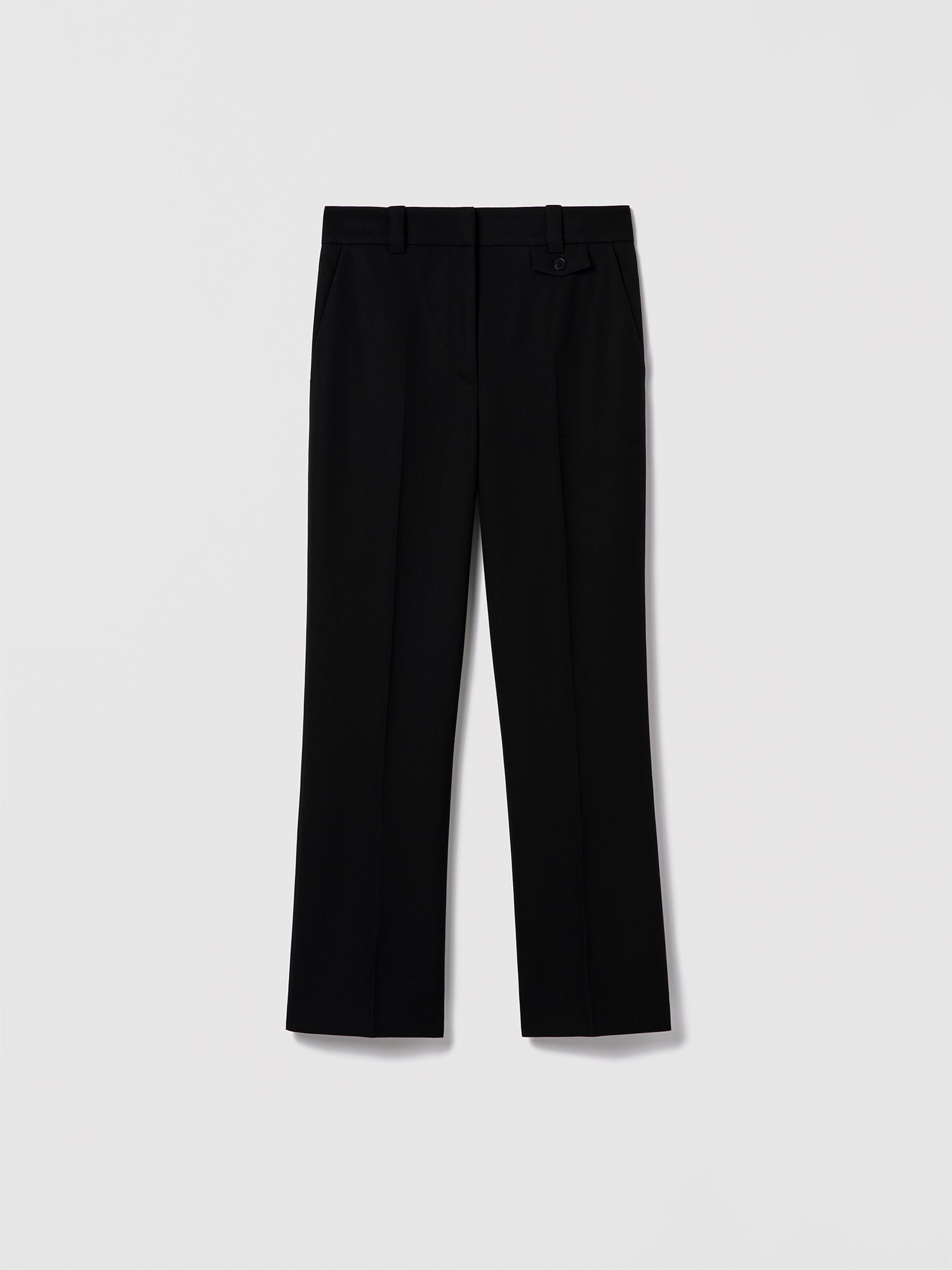Black tailored wool pant by Judith & Charles, featuring slash pockets, back welt pockets, and a zip fly with hook-and-eye closure.