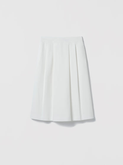 White pleated skirt on a light gray background