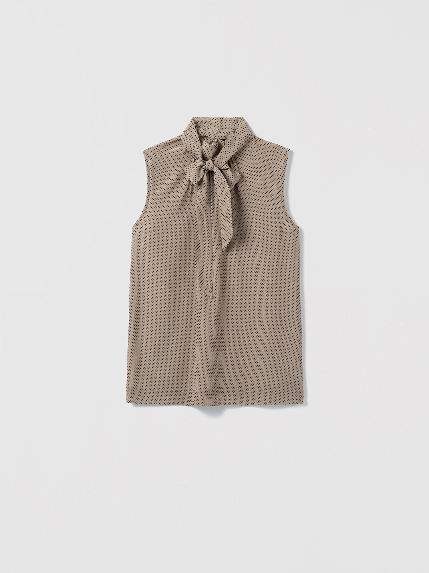Camel sleeveless top with a removable bow detail on a white background