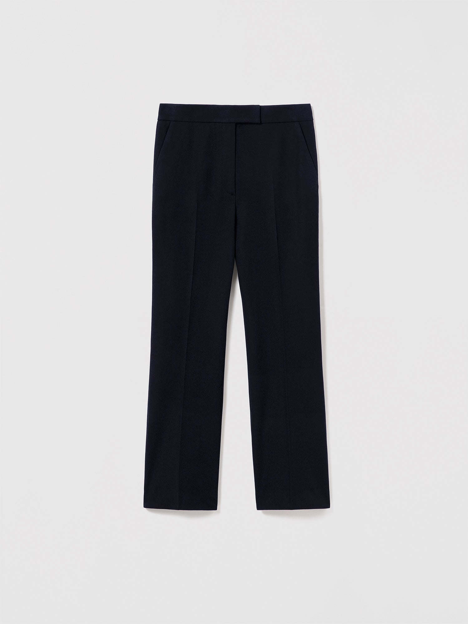 Judith & Charles Robin Pant in navy— cropped kick-flare silhouette with front zip and hook-and-eye closure, scoop front pockets, back welt pockets, and belt loops. Unlined. Made in Portugal.