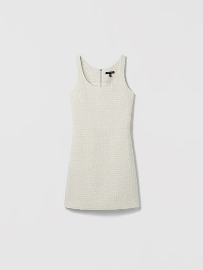 Cream sleeveless dress on a light gray background