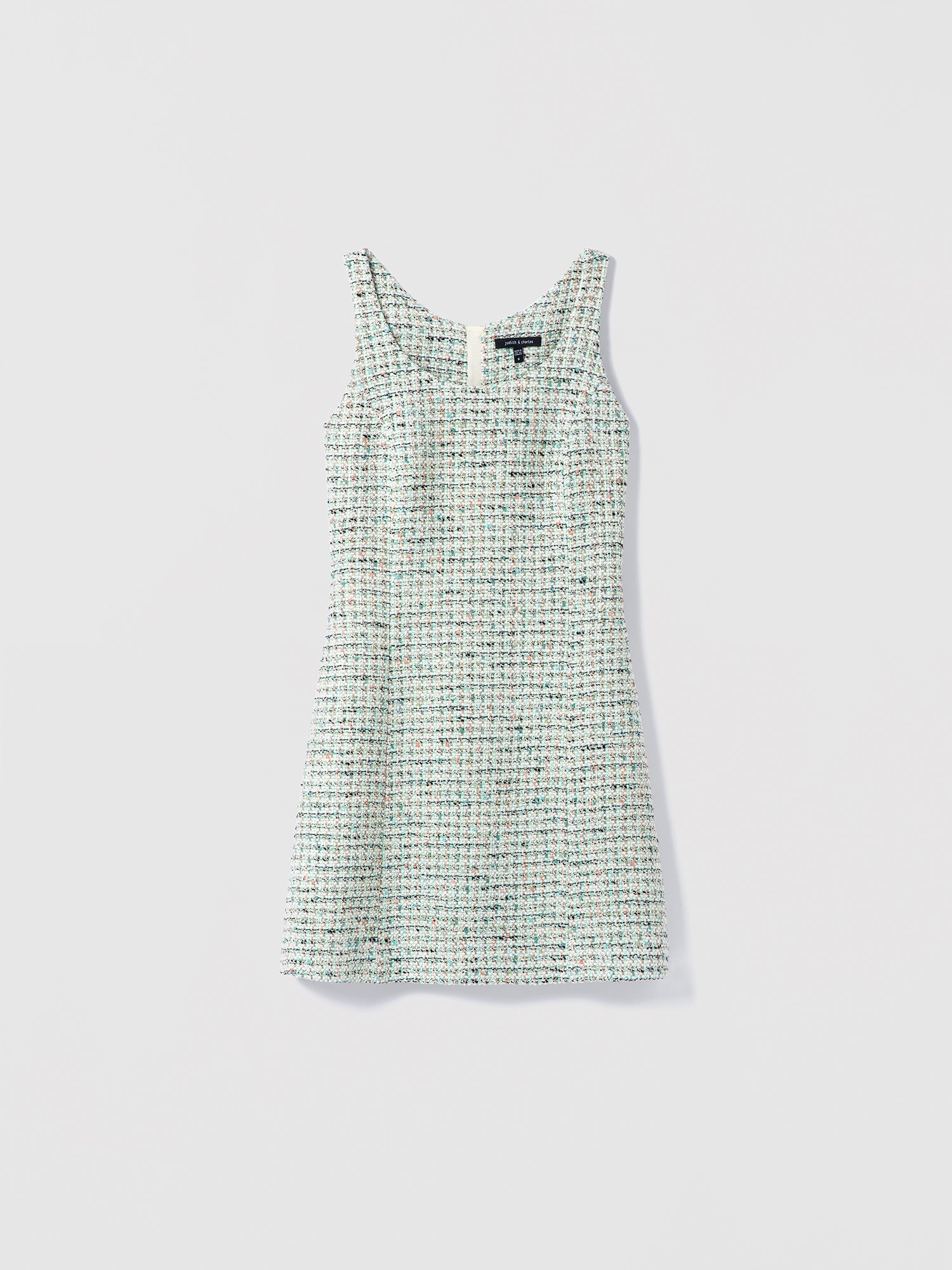 Checkered dress on a light gray background