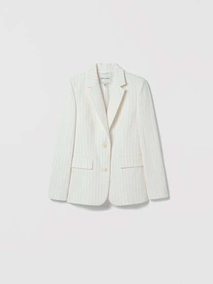 White blazer on a light gray background