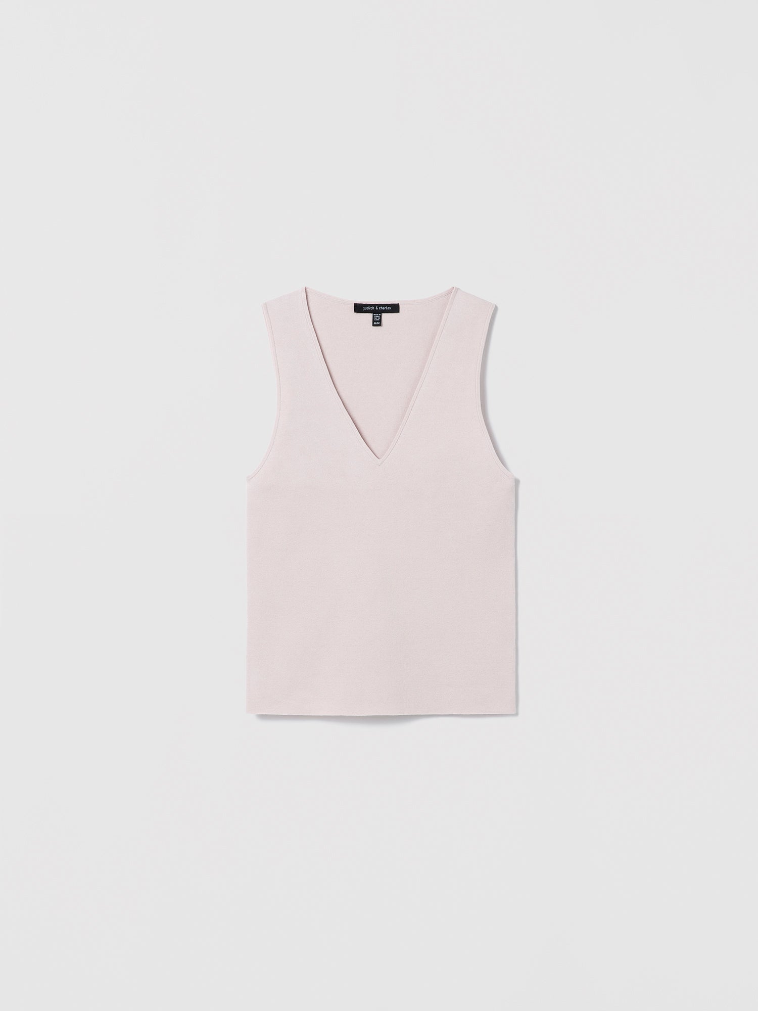 Light pink sleeveless V-neck shell top by Judith and Charles, made from a fine Italian silk-cotton blend. Features a fitted silhouette and a 21.5" back length. Style code: 266-4133.