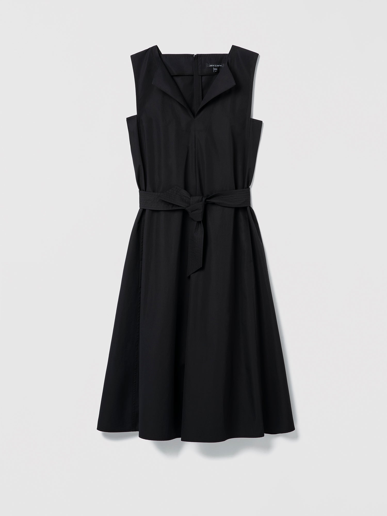 Black sleeveless dress with a belt on a light gray background