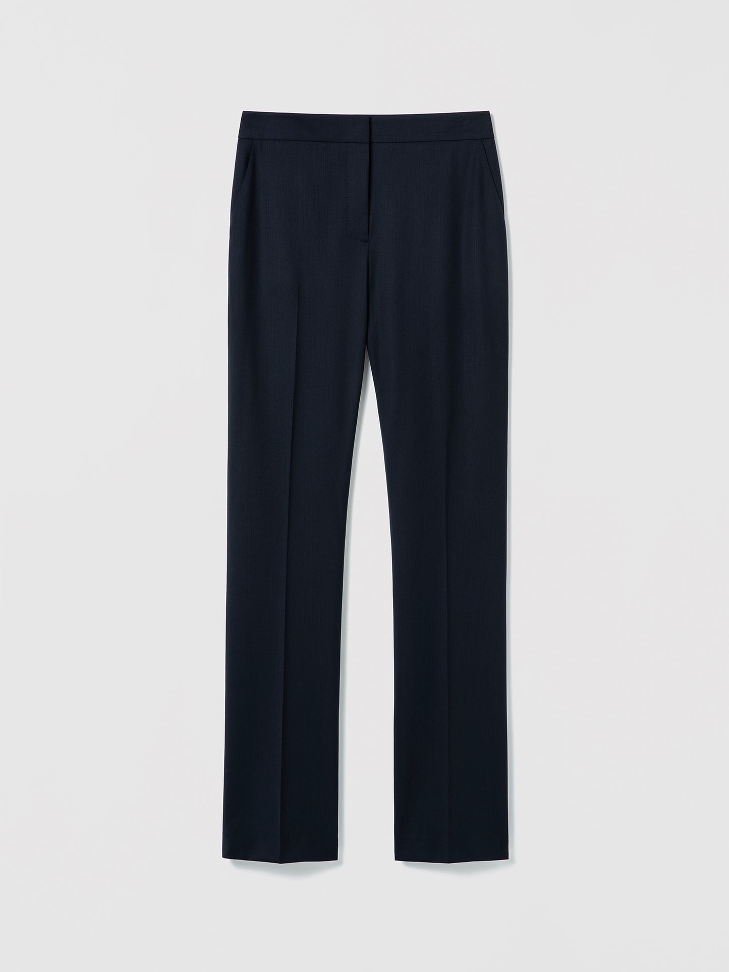 Navy pants on a light gray background